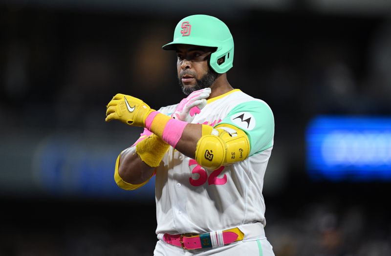 Jun 23, 2023; San Diego, California, USA; San Diego Padres designated hitter Nelson Cruz (32) gestures toward the Paderes bench after hitting a two-RBI single against the Washington Nationals during the seventh inning at Petco Park. Mandatory Credit: Orlando Ramirez-USA TODAY Sports