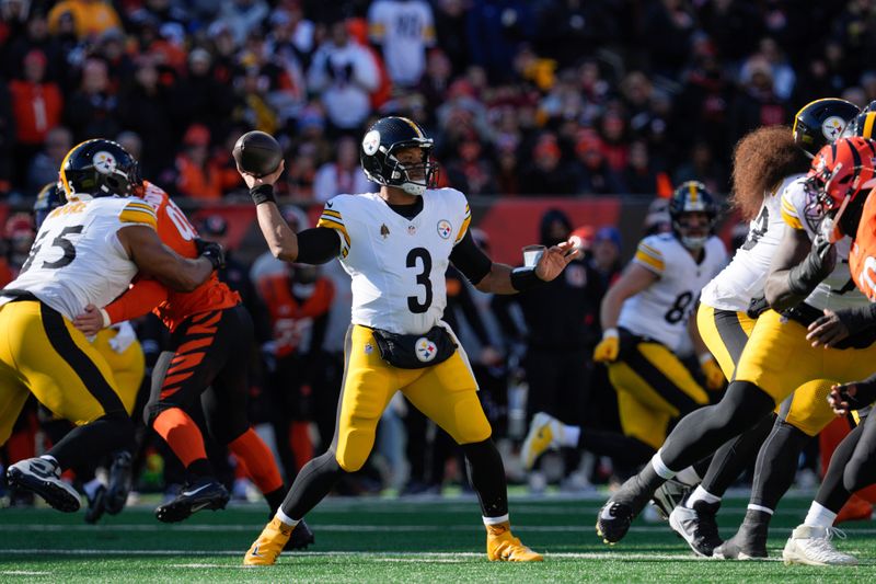 Pittsburgh Steelers quarterback Russell Wilson (3) passes during the first half of an NFL football game against the Cincinnati Bengals, Sunday, Dec. 1, 2024, in Cincinnati. (AP Photo/Jeff Dean)