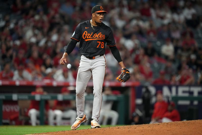 May 9, 2025; Anaheim, California, USA; Baltimore Orioles relief pitcher Yennier Cano (78) reacts after a strikeout in the eighth inning against the Los Angeles Angels at Angel Stadium. Mandatory Credit: Kirby Lee-Imagn Images