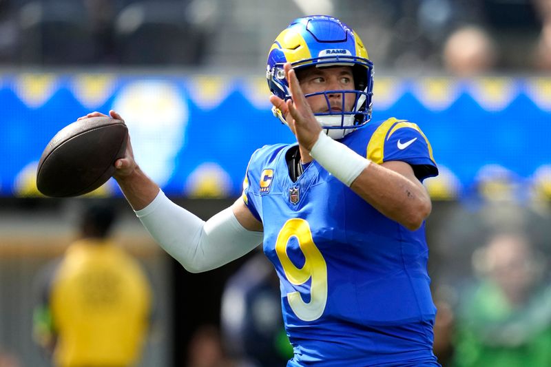 Los Angeles Rams quarterback Matthew Stafford (9) throws a pass during the first half of an NFL football game against the Arizona Cardinals Sunday, Oct. 15, 2023, in Inglewood, Calif. (AP Photo/Ashley Landis)