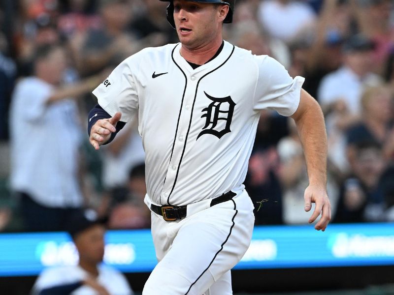 Jun 29, 2025; Detroit, Michigan, USA; Detroit Tigers designated hitter Colt Keith (33) scores a run on an RBI triple by Tigers right fielder Kerry Carpenter (not pictured) in the fifth inning at Comerica Park. Mandatory Credit: Lon Horwedel-Imagn Images
