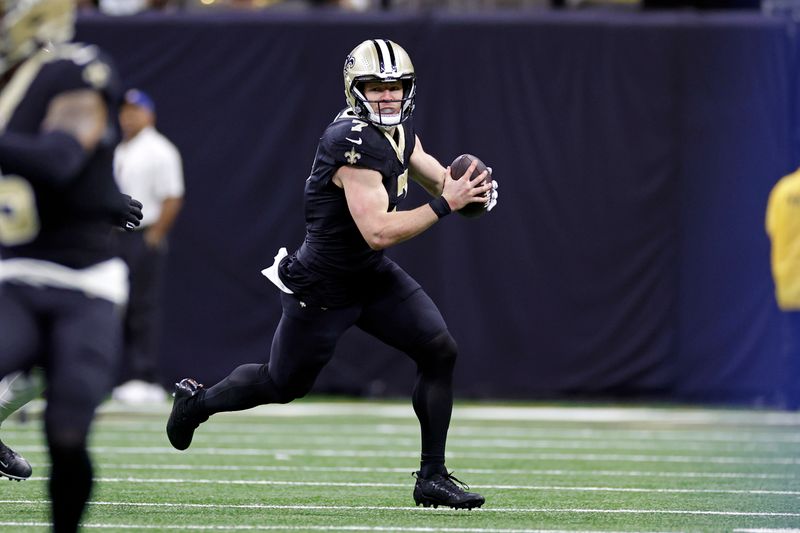 New Orleans Saints quarterback Taysom Hill (7) during an NFL football game against the Atlanta Falcons, Sunday, Jan. 7, 2024, in New Orleans. (AP Photo/Tyler Kaufman)