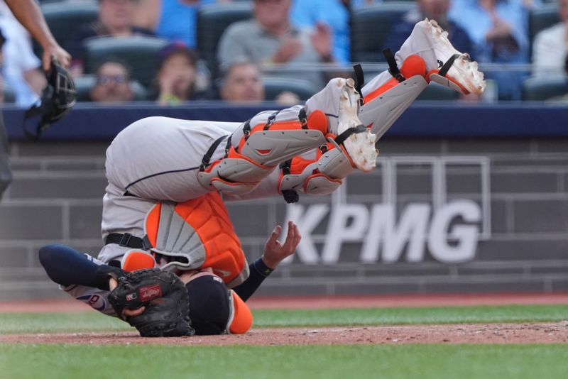 Sep 11, 2025; Toronto, Ontario, CAN; Houston Astros catcher Yainer Diaz (21) does a somersault after catching a pop fly from Toronto Blue Jays shortstop Ernie Clement (not pictured) during the eighth inning at Rogers Centre. Mandatory Credit: John E. Sokolowski-Imagn Images