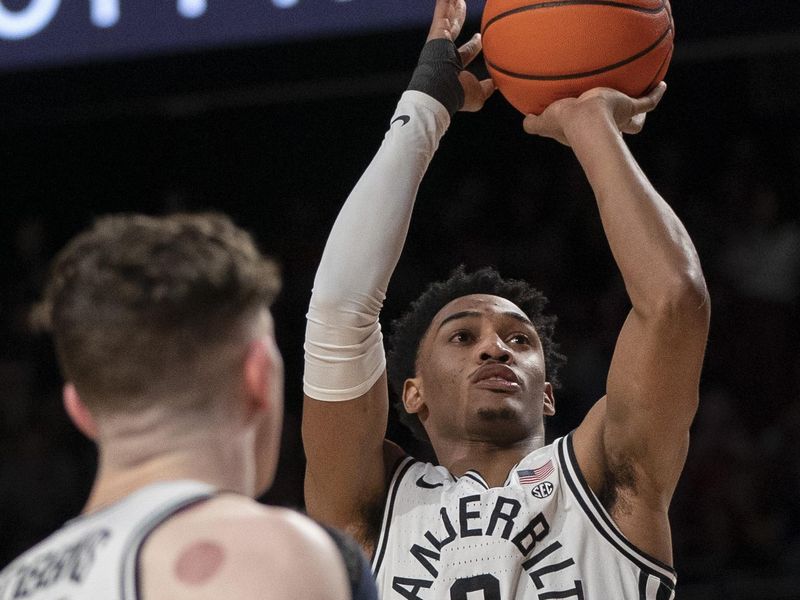 Feb 18, 2023; Nashville, Tennessee, USA;   Vanderbilt Commodores guard Tyrin Lawrence (0) shoots the ball over Auburn Tigers forward Johni Broome (4) during the first half at Memorial Gymnasium.  Mandatory Credit: George Walker IV - USA TODAY Sports