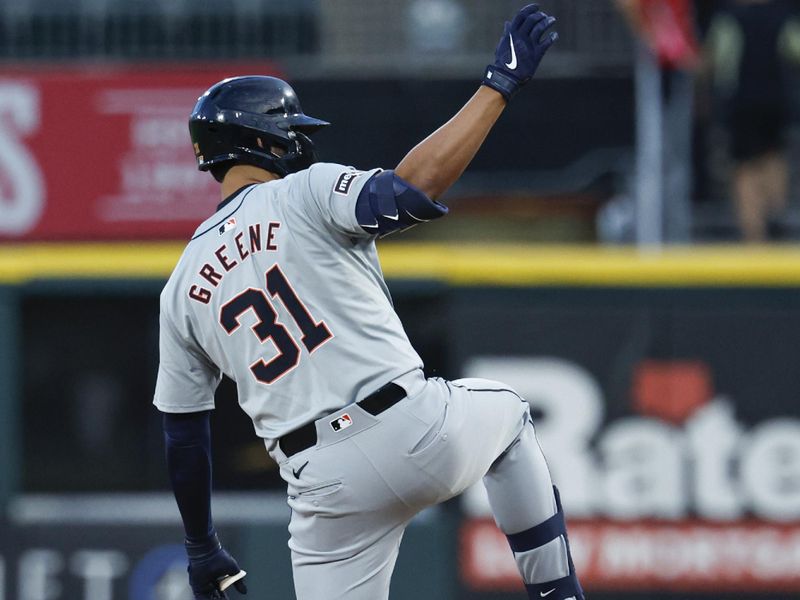Aug 23, 2024; Chicago, Illinois, USA; Detroit Tigers outfielder Riley Greene (31) reacts after hitting a double against the Chicago White Sox during the first inning at Guaranteed Rate Field. Mandatory Credit: Kamil Krzaczynski-USA TODAY Sports