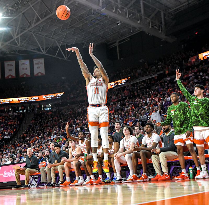 Feb 4, 2023; Clemson, South Carolina, USA; Clemson guard Brevin Galloway (11) shoots a three-pointer against Miami during the second half at Littlejohn Coliseum in Clemson, S.C. Saturday, Feb. 4, 2023. Miami won 78-74.   Mandatory Credit: Ken Ruinard-USA TODAY Sports