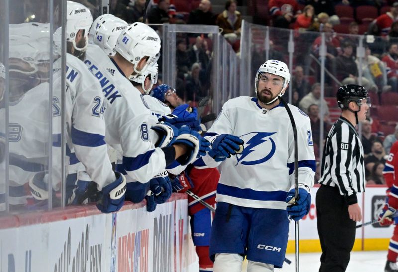 Nov 7, 2023; Montreal, Quebec, CAN; Tampa Bay Lightning forward Nicholas Paul (20) celebrates with teammates after scoring a goal against the Montreal Canadiens during the third period at the Bell Centre. Mandatory Credit: Eric Bolte-USA TODAY Sports