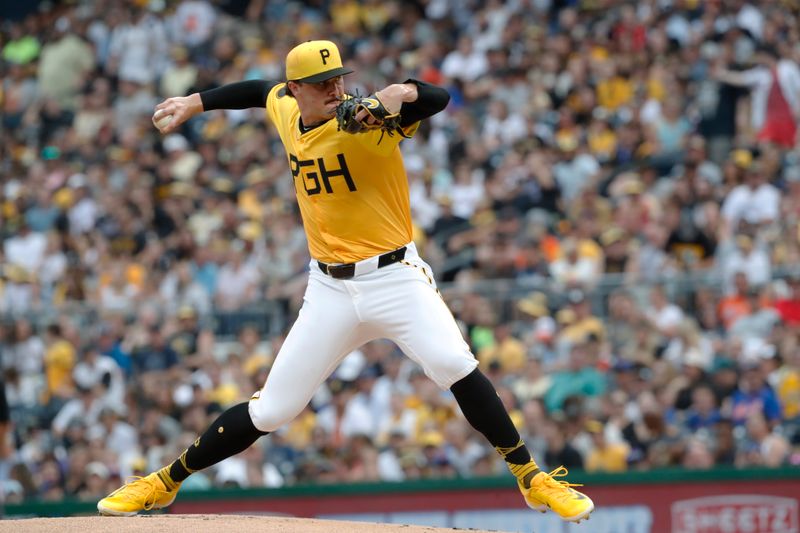 Jul 5, 2024; Pittsburgh, Pennsylvania, USA;  Pittsburgh Pirates starting pitcher Paul Skenes (30) delivers a pitch against the New York Mets during the first inning at PNC Park. Mandatory Credit: Charles LeClaire-USA TODAY Sports