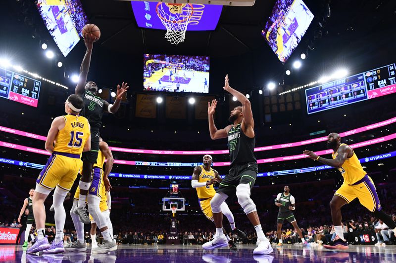 LOS ANGELES, CA - APRIL 30:  Anthony Edwards #5 of the Minnesota Timberwolves drives to the basket during the game against the Los Angeles Lakers  during Round 1 Game 5 of the 2025 NBA Playoffs on April 30, 2025 at Crypto.Com Arena in Los Angeles, California. NOTE TO USER: User expressly acknowledges and agrees that, by downloading and/or using this Photograph, user is consenting to the terms and conditions of the Getty Images License Agreement. Mandatory Copyright Notice: Copyright 2025 NBAE (Photo by Juan Ocampo/NBAE via Getty Images)