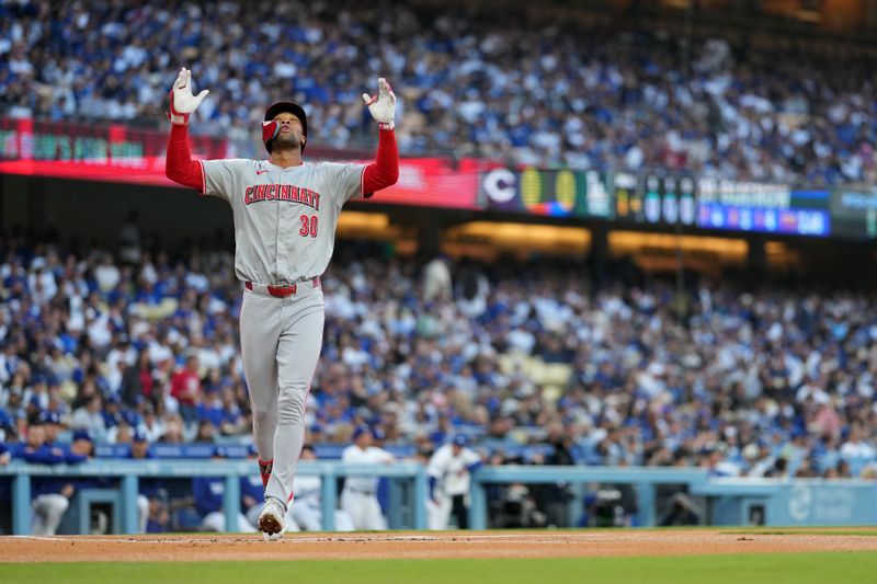 May 16, 2024; Los Angeles, California, USA; Cincinnati Reds center fielder Will Benson (30) celebrates after hitting a home run in the first inning against the Los Angeles Dodgers at Dodger Stadium. Mandatory Credit: Kirby Lee-USA TODAY Sports