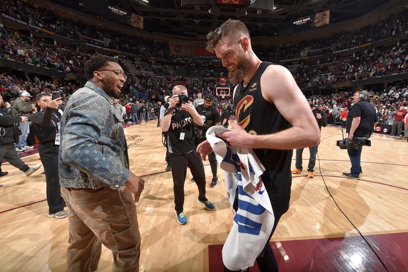 CLEVELAND, OH - MARCH 5: Donovan Mitchell #45 and Dean Wade #32 of the Cleveland Cavaliers celebrate after the game against the Boston Celtics on March 5, 2024 at Rocket Mortgage FieldHouse in Cleveland, Ohio. NOTE TO USER: User expressly acknowledges and agrees that, by downloading and/or using this Photograph, user is consenting to the terms and conditions of the Getty Images License Agreement. Mandatory Copyright Notice: Copyright 2024 NBAE (Photo by David Liam Kyle/NBAE via Getty Images)