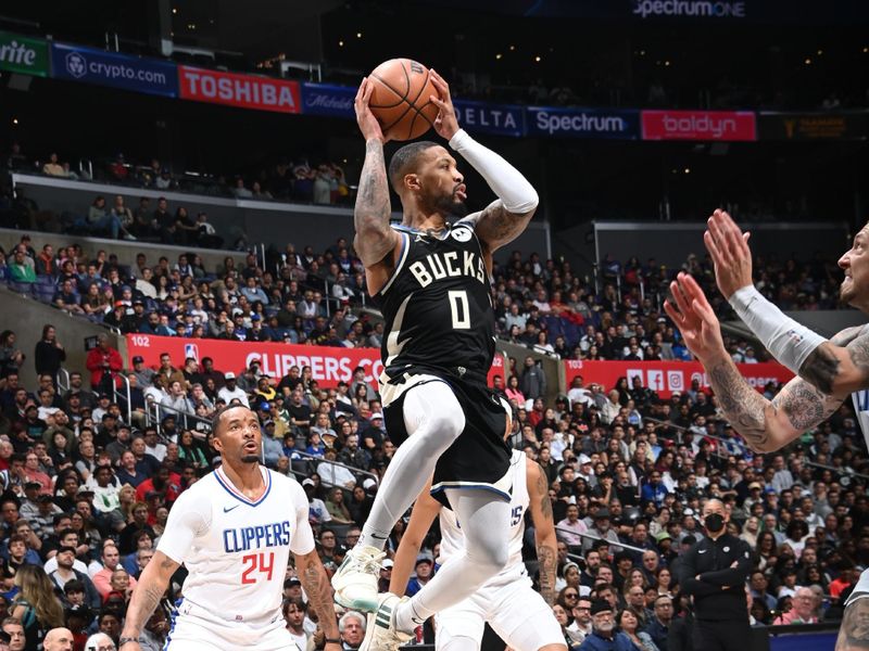 LOS ANGELES, CA - MARCH 10: Damian Lillard #0 of the Milwaukee Bucks passes the ball during the game against the LA Clippers on March 10, 2024 at Crypto.Com Arena in Los Angeles, California. NOTE TO USER: User expressly acknowledges and agrees that, by downloading and/or using this Photograph, user is consenting to the terms and conditions of the Getty Images License Agreement. Mandatory Copyright Notice: Copyright 2024 NBAE (Photo by Andrew D. Bernstein/NBAE via Getty Images)