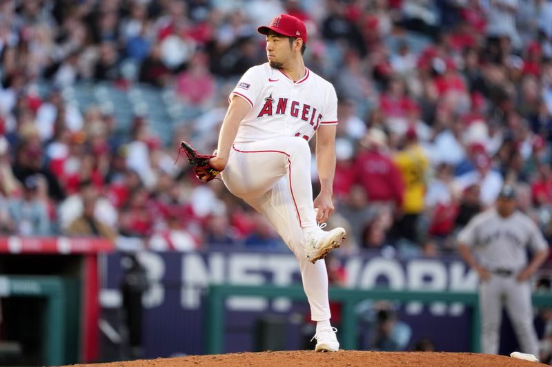 May 28, 2025; Anaheim, California, USA; Los Angeles Angels starting pitcher Yusei Kikuchi (16) throws in the second inning against the New York Yankees at Angel Stadium. Mandatory Credit: Kirby Lee-Imagn Images