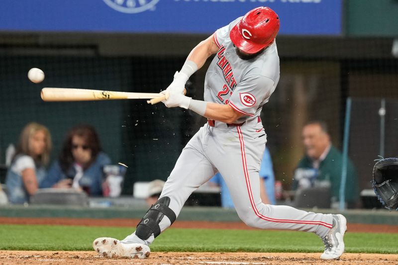 Apr 28, 2024; Arlington, Texas, USA; Cincinnati Reds designated hitter Nick Martini (23) connects on a broken bat single against the Texas Rangers during the fifth inning at Globe Life Field. Mandatory Credit: Jim Cowsert-USA TODAY Sports