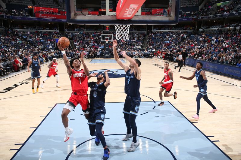 MEMPHIS, TN - FEBRUARY 14: Amen Thompson #1 of the Houston Rockets drives to the basket during the game against the Memphis Grizzlies on February 14, 2024 at FedExForum in Memphis, Tennessee. NOTE TO USER: User expressly acknowledges and agrees that, by downloading and or using this photograph, User is consenting to the terms and conditions of the Getty Images License Agreement. Mandatory Copyright Notice: Copyright 2024 NBAE (Photo by Joe Murphy/NBAE via Getty Images)