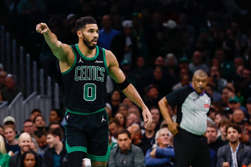 BOSTON, MASSACHUSETTS - NOVEMBER 19: Jayson Tatum #0 of the Boston Celtics reacts on defense while playing the Cleveland Cavaliers during the first quarter of the Emirates NBA Cup at TD Garden on November 19, 2024 in Boston, Massachusetts. NOTE TO USER: User expressly acknowledges and agrees that, by downloading and or using this photograph, User is consenting to the terms and conditions of the Getty Images License Agreement.  (Photo by Winslow Townson/Getty Images)