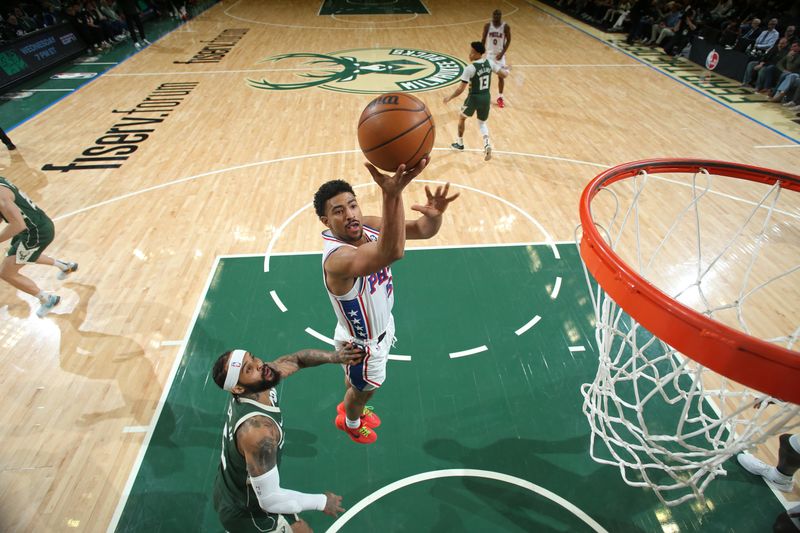 MILWAUKEE, WI - FEBRUARY 9: Quentin Grimes #5 of the Philadelphia 76ers drives to the basket during the game against the Milwaukee Bucks of the Philadelphia 76ers  on February 9, 2025 at Fiserv Forum Center in Milwaukee, Wisconsin. NOTE TO USER: User expressly acknowledges and agrees that, by downloading and or using this Photograph, user is consenting to the terms and conditions of the Getty Images License Agreement. Mandatory Copyright Notice: Copyright 2025 NBAE(Photo by Gary Dineen/NBAE via Getty Images).