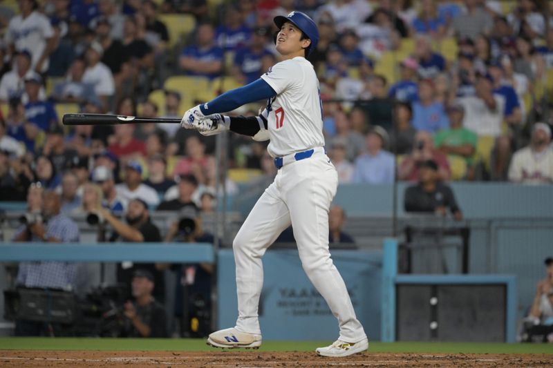 Aug 6, 2024; Los Angeles, California, USA;  Los Angeles Dodgers designated hitter Shohei Ohtani (17) flies out in the third inning against the Philadelphia Phillies at Dodger Stadium. Mandatory Credit: Jayne Kamin-Oncea-USA TODAY Sports