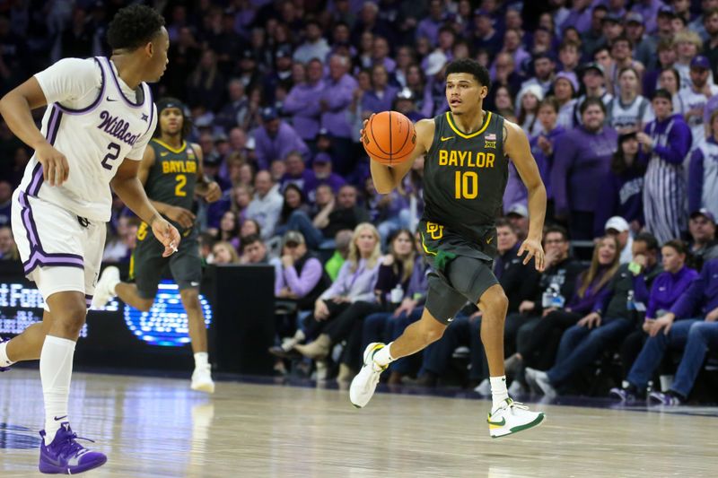 Jan 16, 2024; Manhattan, Kansas, USA; Baylor Bears guard RayJ Dennis (10) brings the ball up court during overtime against the Kansas State Wildcats at Bramlage Coliseum. Mandatory Credit: Scott Sewell-USA TODAY Sports