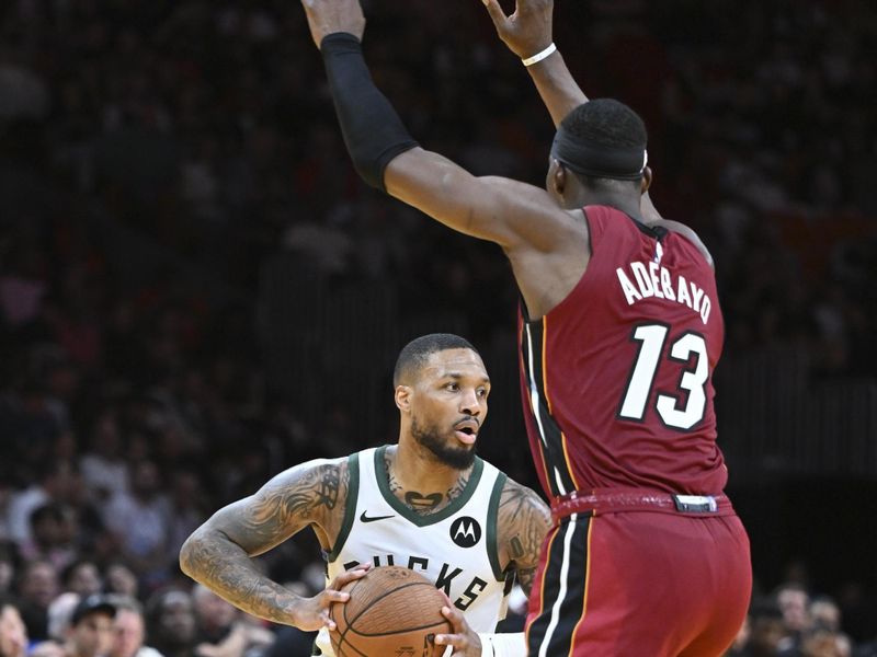 MIAMI, FL - NOVEMBER 26:  Damian Lillard #0 of the Milwaukee Bucks looks to pass the ball during an NBA Cup game against the Miami Heat on November 26, 2024 at Kaseya Center in Miami, Florida. NOTE TO USER: User expressly acknowledges and agrees that, by downloading and or using this Photograph, user is consenting to the terms and conditions of the Getty Images License Agreement. Mandatory Copyright Notice: Copyright 2024 NBAE (Photo by Chris Tilley/NBAE via Getty Images)