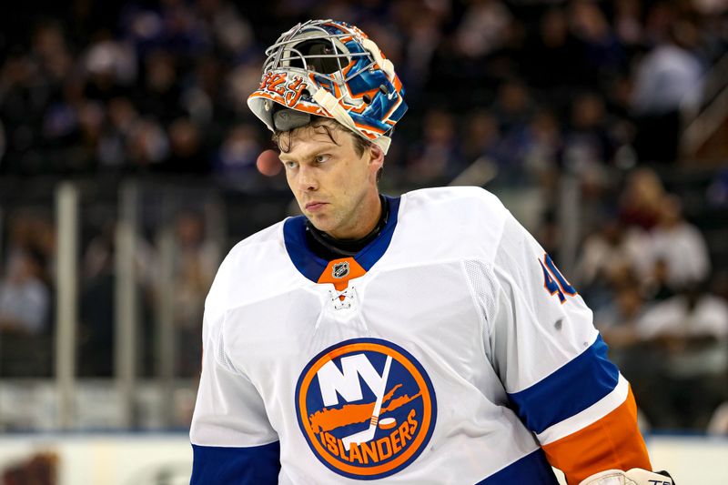 Sep 24, 2024; New York, New York, USA; New York Islanders goalie Semyon Varlamov (40) skates during a timeout against the New York Rangers during the first period at Madison Square Garden. Mandatory Credit: Danny Wild-Imagn Images