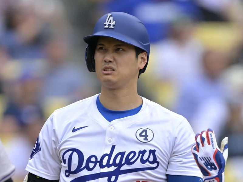 Jun 2, 2024; Los Angeles, California, USA;  Los Angeles Dodgers designated hitter Shohei Ohtani (17) reacts after fouling off a pitch in the fifth inning against the Colorado Rockies at Dodger Stadium. Mandatory Credit: Jayne Kamin-Oncea-USA TODAY Sports