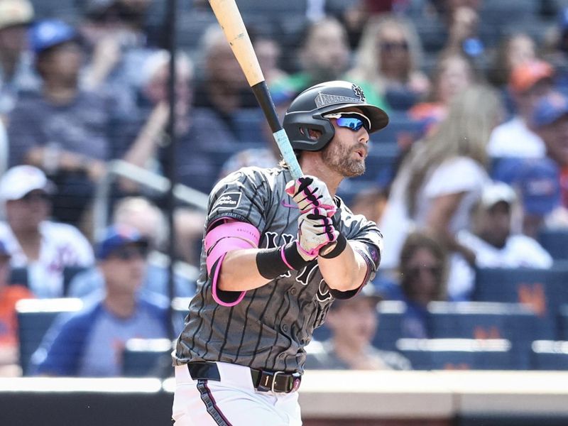 Jul 13, 2024; New York City, New York, USA;  New York Mets second baseman Jeff McNeil (1) hits a two run double in the second inning against the Colorado Rockies at Citi Field. Mandatory Credit: Wendell Cruz-USA TODAY Sports