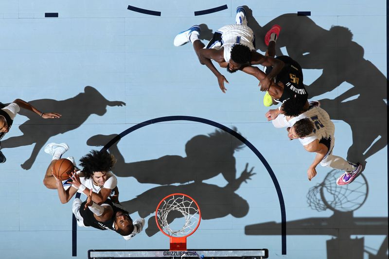 MEMPHIS, TN - JANUARY 26:  Anthony Black #0 of the Orlando Magic drives to the basket during the game against the Memphis Grizzlies on January 26, 2024 at FedExForum in Memphis, Tennessee. NOTE TO USER: User expressly acknowledges and agrees that, by downloading and or using this photograph, User is consenting to the terms and conditions of the Getty Images License Agreement. Mandatory Copyright Notice: Copyright 2024 NBAE (Photo by Joe Murphy/NBAE via Getty Images)