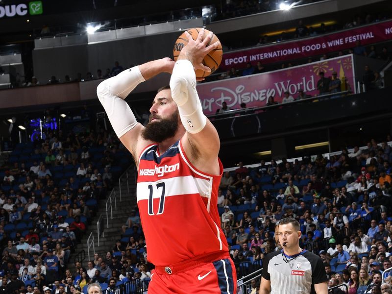 ORLANDO, FL - NOVMEBER 10: Jonas Valanciunas #17 of the Washington Wizards looks to pass the ball during the game against the Orlando Magic on November 10, 2024 at Kia Center in Orlando, Florida. NOTE TO USER: User expressly acknowledges and agrees that, by downloading and or using this photograph, User is consenting to the terms and conditions of the Getty Images License Agreement. Mandatory Copyright Notice: Copyright 2024 NBAE (Photo by Fernando Medina/NBAE via Getty Images)