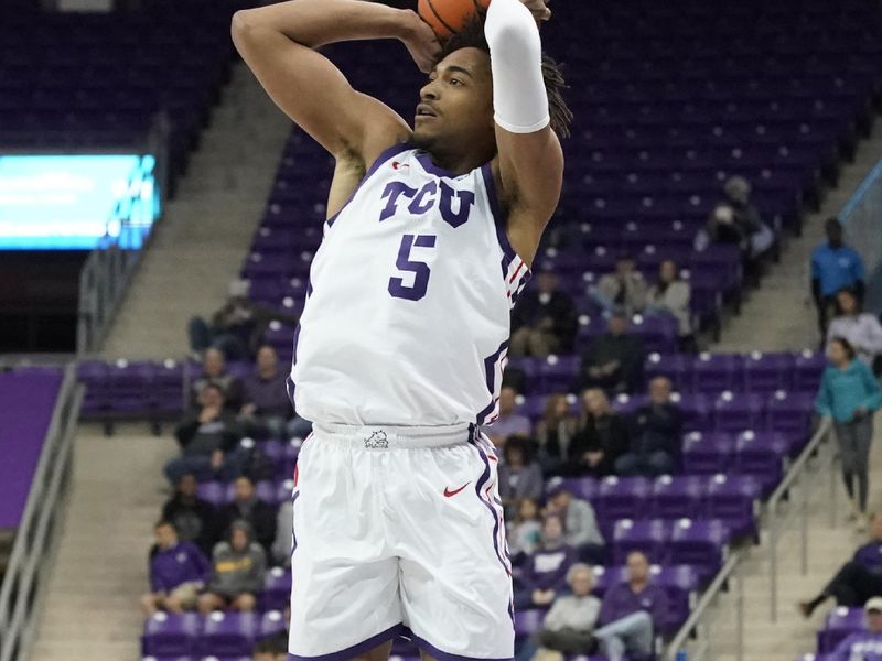 Nov 17, 2022; Fort Worth, Texas, USA; TCU Horned Frogs forward Chuck O'Bannon Jr. (5) shoots the jumps shot during the first half against the Louisiana Monroe Warhawks at Ed and Rae Schollmaier Arena. Mandatory Credit: Raymond Carlin III-USA TODAY Sports