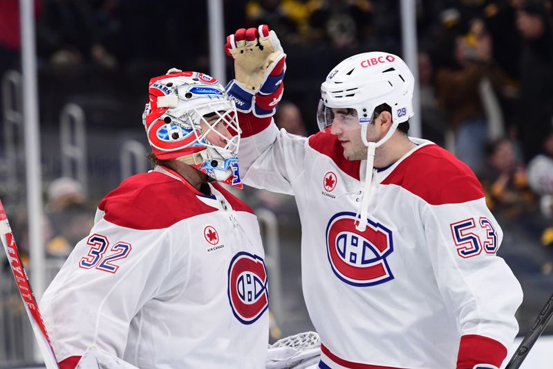 Dec 23, 2025; Boston, Massachusetts, USA; Montreal Canadians defenseman Noah Dobson (53) congratulates goaltender Jacob Fowler (32) after defeating the Boston Bruins at TD Garden. Mandatory Credit: Bob DeChiara-Imagn Images