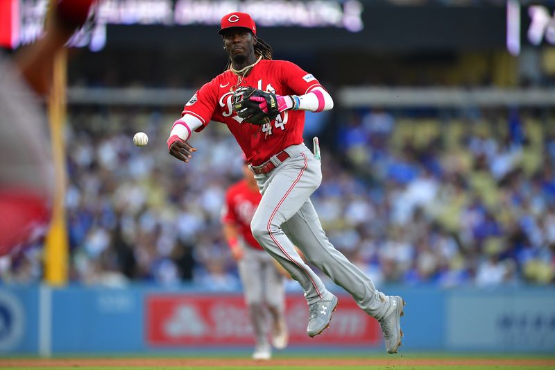 Jul 29, 2023; Los Angeles, California, USA; Cincinnati Reds shortstop Elly De La Cruz (44) throws to first for the out against Los Angeles Dodgers left fielder David Peralta (6) during the fifth inning at Dodger Stadium. Mandatory Credit: Gary A. Vasquez-USA TODAY Sports