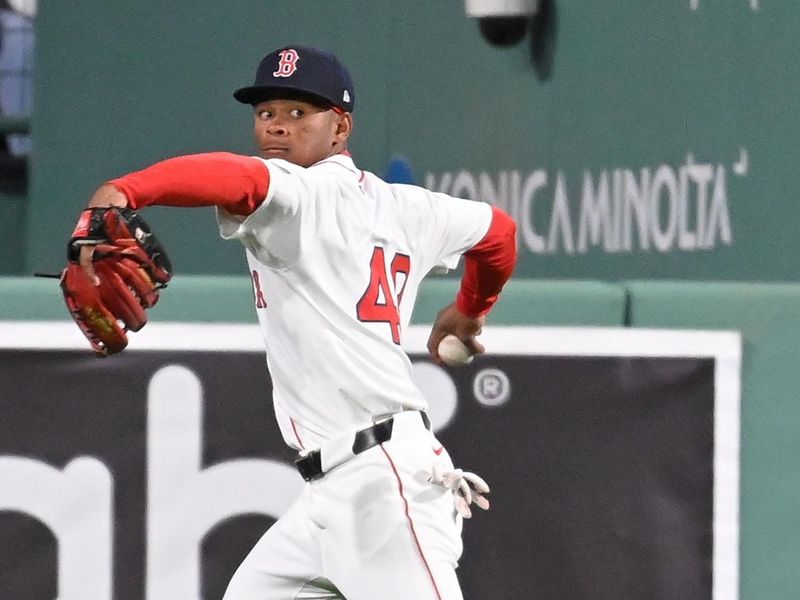 Apr 17, 2024; Boston, Massachusetts, USA;  Boston Red Sox center fielder Ceddanne Rafaela (43) makes a play against the Cleveland Guardians in the outfield during the fourth inning at Fenway Park. Mandatory Credit: Eric Canha-USA TODAY Sports