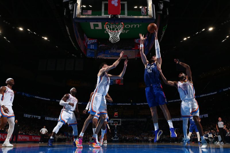 OKLAHOMA CITY, OK - FEBRUARY 22: Ivica Zubac #40 of the LA Clippers rebounds the ball during the game against the Oklahoma City Thunder on February 22SF, 2024 at Paycom Arena in Oklahoma City, Oklahoma. NOTE TO USER: User expressly acknowledges and agrees that, by downloading and or using this photograph, User is consenting to the terms and conditions of the Getty Images License Agreement. Mandatory Copyright Notice: Copyright 2024 NBAE (Photo by Zach Beeker/NBAE via Getty Images)