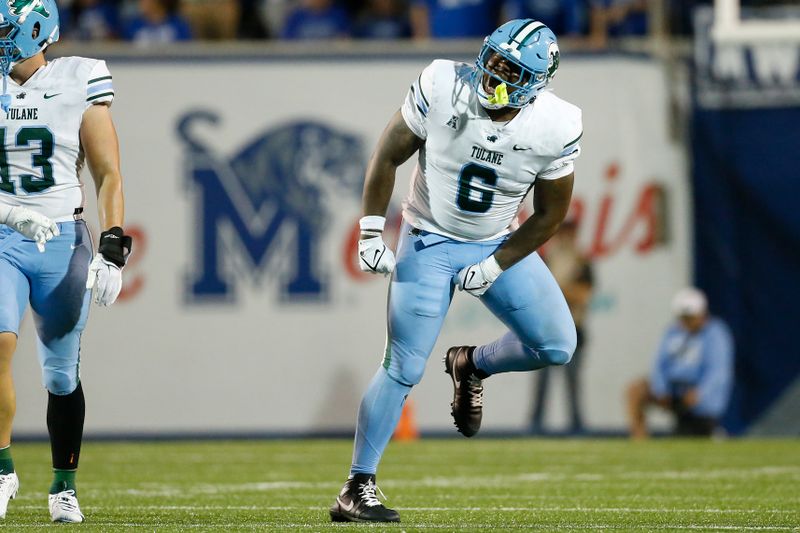 Oct 13, 2023; Memphis, Tennessee, USA; Tulane Green Wave defensive linemen Darius Hodges (6) reacts after a sack during the second half against the Memphis Tigers at Simmons Bank Liberty Stadium. Mandatory Credit: Petre Thomas-USA TODAY Sports