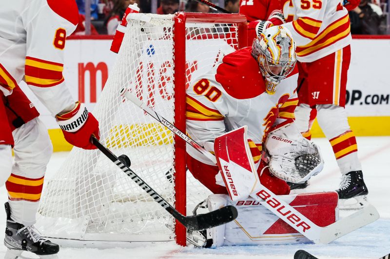 Oct 22, 2023; Detroit, Michigan, USA;  Calgary Flames goaltender Dan Vladar (80) makes a save in the second period against the Detroit Red Wings at Little Caesars Arena. Mandatory Credit: Rick Osentoski-USA TODAY Sports