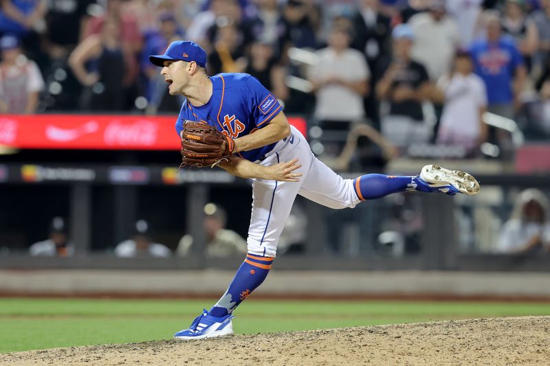 Jul 18, 2023; New York City, New York, USA; New York Mets relief pitcher David Robertson (30) follows through on a pitch against the Chicago White Sox during the ninth inning at Citi Field. Mandatory Credit: Brad Penner-USA TODAY Sports