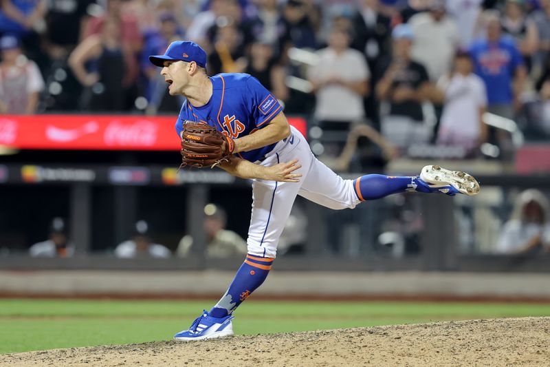 Jul 18, 2023; New York City, New York, USA; New York Mets relief pitcher David Robertson (30) follows through on a pitch against the Chicago White Sox during the ninth inning at Citi Field. Mandatory Credit: Brad Penner-USA TODAY Sports