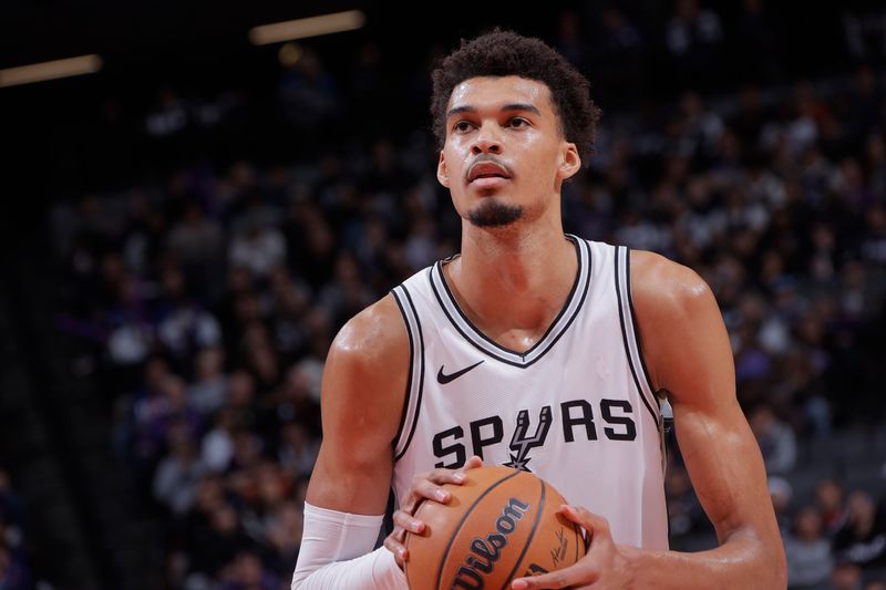 SACRAMENTO, CA - DECEMBER 1: Victor Wembanyama #1 of the San Antonio Spurs looks on during the game against the Sacramento Kings on December 1, 2024 at Golden 1 Center in Sacramento, California. NOTE TO USER: User expressly acknowledges and agrees that, by downloading and or using this Photograph, user is consenting to the terms and conditions of the Getty Images License Agreement. Mandatory Copyright Notice: Copyright 2024 NBAE (Photo by Rocky Widner/NBAE via Getty Images)