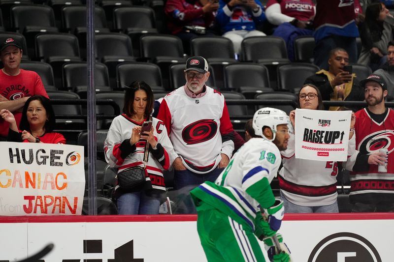 Oct 23, 2025; Denver, Colorado, USA; Carolina Hurricanes fans before the game against the Colorado Avalanche at Ball Arena. Mandatory Credit: Ron Chenoy-Imagn Images