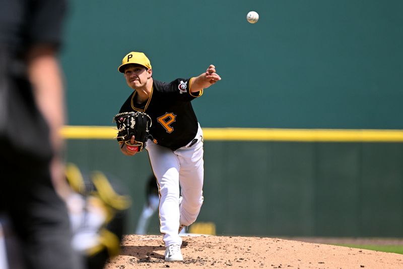 Mar 25, 2024; Bradenton, Florida, USA; Pittsburgh Pirates starting pitcher Marco Gonzalez (27) throws a pitch in the third inning of the spring training game against the Toronto Blue Jays at LECOM Park. Mandatory Credit: Jonathan Dyer-USA TODAY Sports