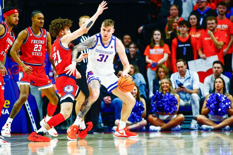 Feb 17, 2024; Boise, Idaho, USA; Boise State Broncos forward Cam Martin (31)during the first half against the Fresno State Bulldogs at ExtraMile Arena. Mandatory Credit: Brian Losness-USA TODAY Sports