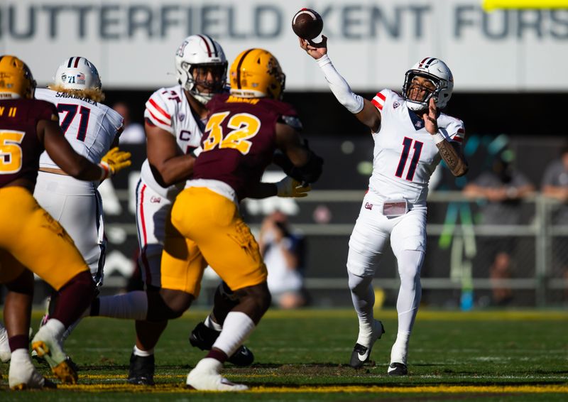 Nov 25, 2023; Tempe, Arizona, USA; Arizona Wildcats quarterback Noah Fifita (11) against the Arizona State Sun Devils in the first half of the Territorial Cup at Mountain America Stadium. Mandatory Credit: Mark J. Rebilas-USA TODAY Sports