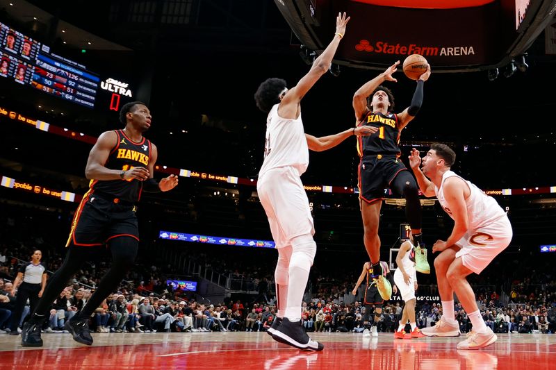 ATLANTA, GEORGIA - JANUARY 20: Jalen Johnson #1 of the Atlanta Hawks goes up against Jarrett Allen #31 of the Cleveland Cavaliers during the second half at State Farm Arena on January 20, 2024 in Atlanta, Georgia. NOTE TO USER: User expressly acknowledges and agrees that, by downloading and or using this photograph, User is consenting to the terms and conditions of the Getty Images License Agreement. (Photo by Alex Slitz/Getty Images)