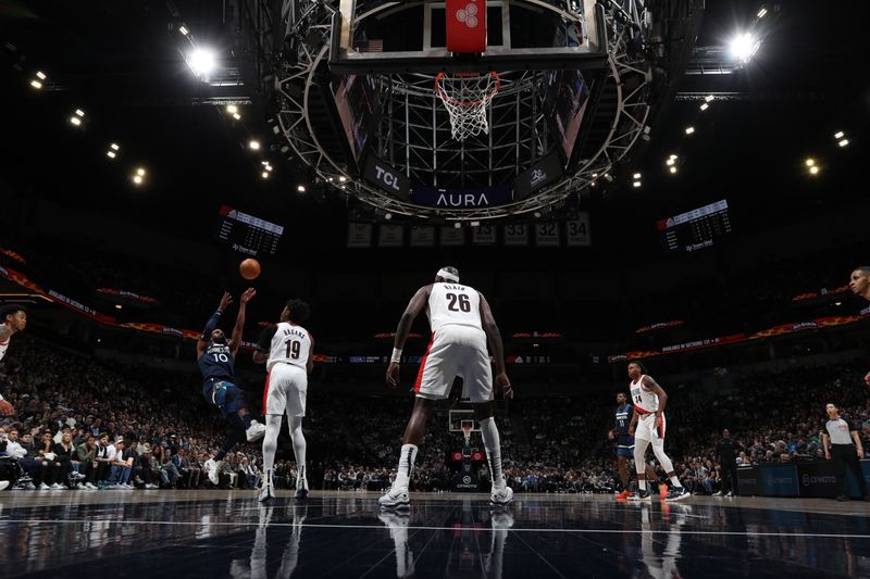 MINNEAPOLIS, MN -  MARCH 4: Mike Conley #10 of the Minnesota Timberwolves drives to the basket during the game against the Portland Trail Blazers on March 4, 2024 at Target Center in Minneapolis, Minnesota. NOTE TO USER: User expressly acknowledges and agrees that, by downloading and or using this Photograph, user is consenting to the terms and conditions of the Getty Images License Agreement. Mandatory Copyright Notice: Copyright 2024 NBAE (Photo by Jordan Johnson/NBAE via Getty Images)