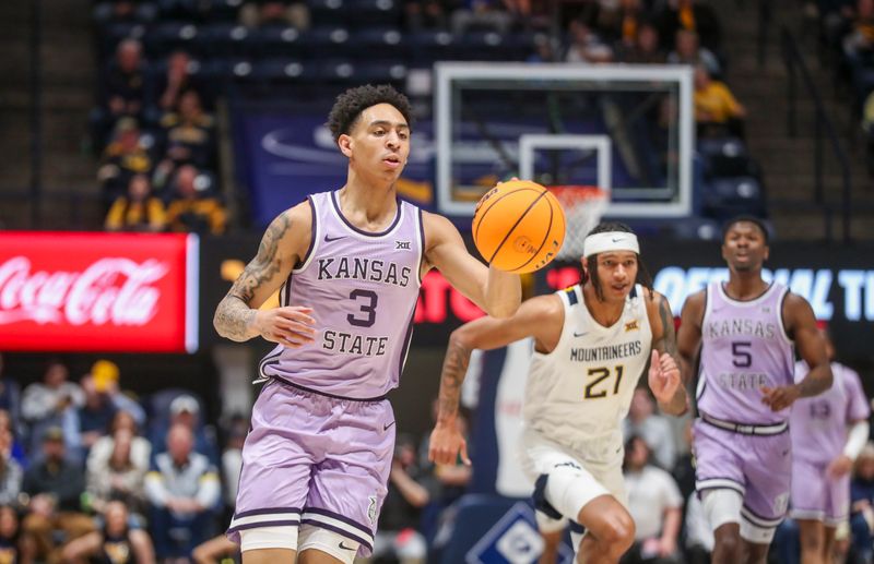 Jan 9, 2024; Morgantown, West Virginia, USA; Kansas State Wildcats guard Dorian Finister (3) dribbles during a fast break during the first half against the West Virginia Mountaineers at WVU Coliseum. Mandatory Credit: Ben Queen-USA TODAY Sports