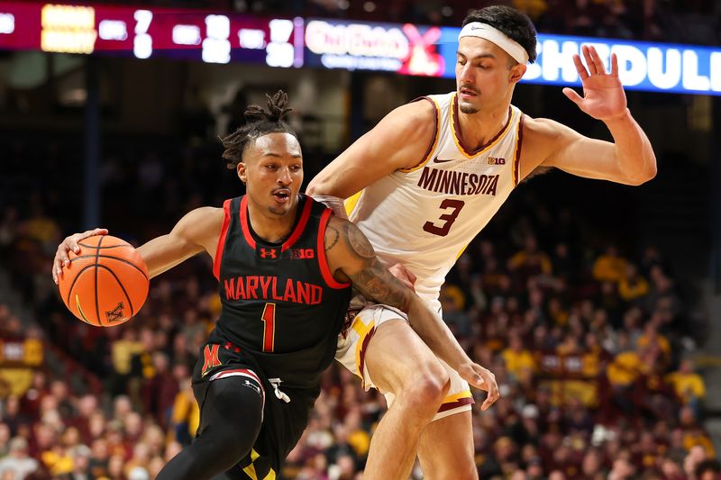 Jan 7, 2024; Minneapolis, Minnesota, USA; Maryland Terrapins guard Jahmir Young (1) works towards the basket as Minnesota Golden Gophers forward Dawson Garcia (3) defends during the second half at Williams Arena. Mandatory Credit: Matt Krohn-USA TODAY Sports