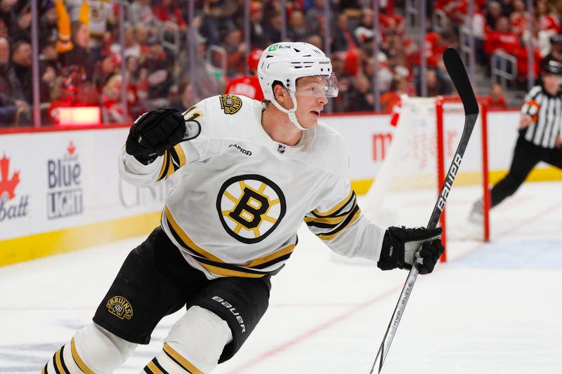 Dec 31, 2023; Detroit, Michigan, USA; Boston Bruins center Trent Frederic (11) reacts to an open net goal during the third period of the game between the Boston Bruins and the Detroit Red Wings at Little Caesars Arena. Mandatory Credit: Brian Bradshaw Sevald-USA TODAY Sports