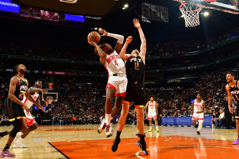 PHOENIX, AZ - OCTOBER 30: Jalen Green #4 of the Houston Rockets drives to the basket during the game against the Phoenix Suns on October 30, 2022 at Footprint Center in Phoenix, Arizona. NOTE TO USER: User expressly acknowledges and agrees that, by downloading and or using this photograph, user is consenting to the terms and conditions of the Getty Images License Agreement. Mandatory Copyright Notice: Copyright 2022 NBAE (Photo by Kate Frese/NBAE via Getty Images)