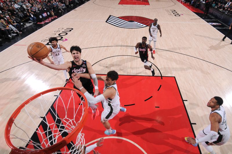 PORTLAND, OR - JANUARY 28: Deni Avdija #8 of the Portland Trail Blazers drives to the basket during the game against the Milwaukee Bucks on January 28, 2025 at the Moda Center Arena in Portland, Oregon. NOTE TO USER: User expressly acknowledges and agrees that, by downloading and or using this photograph, user is consenting to the terms and conditions of the Getty Images License Agreement. Mandatory Copyright Notice: Copyright 2025 NBAE (Photo by Cameron Browne/NBAE via Getty Images)